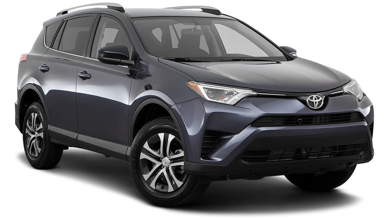 A dark blue 2016 Toyota Rav4 angled right