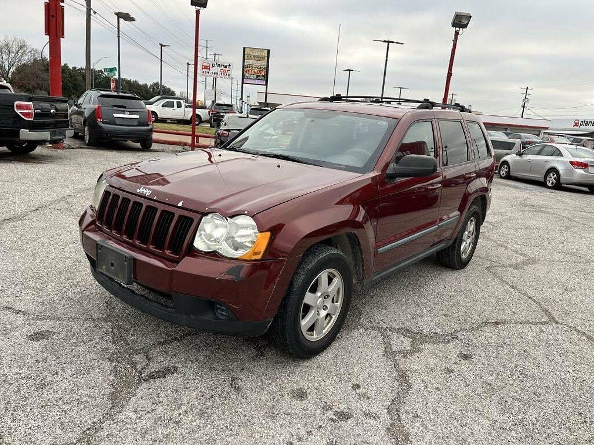 Maroon 2009 Jeep Grand Cherokee Laredo 4WD SUV